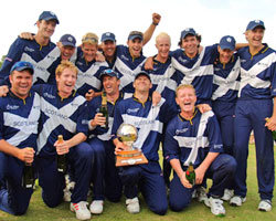 The Scotland team celebrate their victory in the ICC Trophy Final at Clontarf.