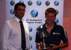 Victorious Scottish captain, Peter Legget, with JCB and NatWest representative Chris Nicholl